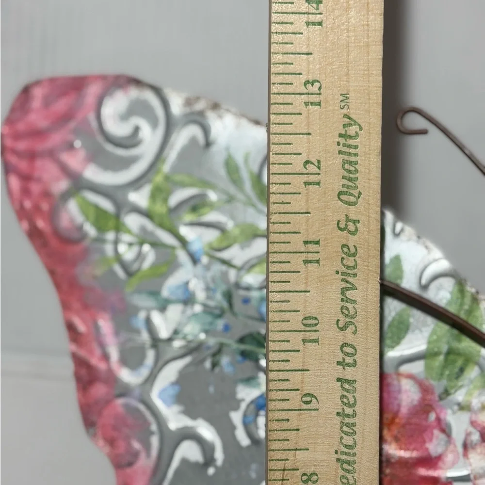 Metal butterfly w/wood accents Hanger on back Perfect for a patio or inside 18.5